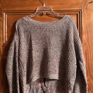 Colorful sweater with cutout back